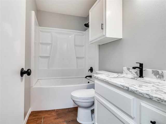 1810 Spring Ave, Stroud, OK 74079 - full bathroom with vanity, bathtub / shower combination, and wood finished floors