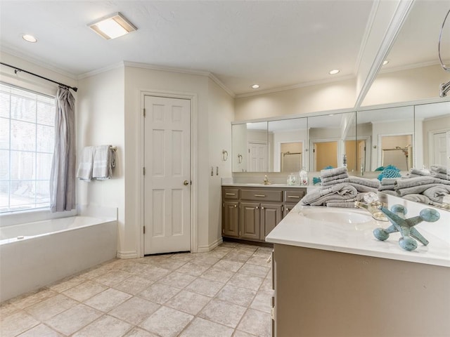 2404 Pawnee Xing, Edmond, OK 73034 - bathroom with vanity, a bath, crown molding, and recessed lighting