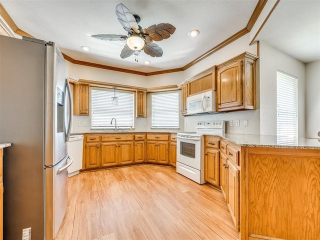 1917 Goldenrod Ln, Midwest City, OK 73130 - kitchen featuring white appliances, ornamental molding, light wood-type flooring, light stone counters, and ceiling fan