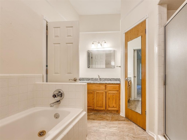 1917 Goldenrod Ln, Midwest City, OK 73130 - full bath with a tub with jets, vanity, and a shower stall
