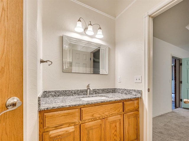 1917 Goldenrod Ln, Midwest City, OK 73130 - bathroom featuring vanity and ornamental molding