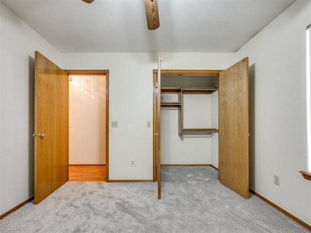 1917 Goldenrod Ln, Midwest City, OK 73130 - unfurnished bedroom featuring carpet flooring, a ceiling fan, and a closet