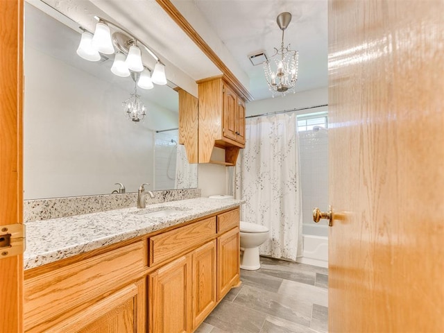 1917 Goldenrod Ln, Midwest City, OK 73130 - full bathroom featuring a chandelier, vanity, and shower / bath combination with curtain