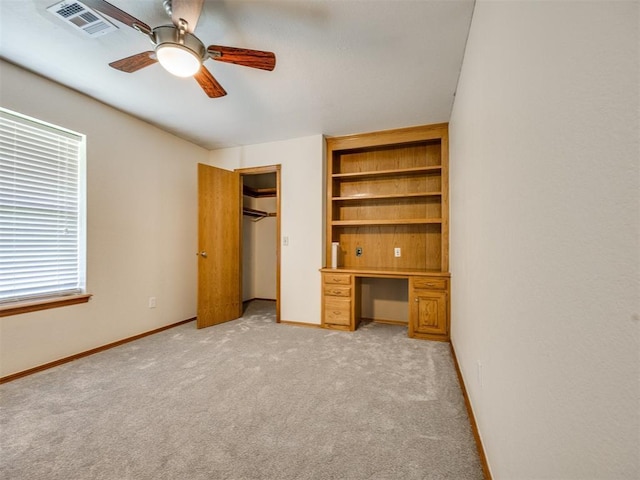 1917 Goldenrod Ln, Midwest City, OK 73130 - unfurnished bedroom with light carpet, a closet, and ceiling fan