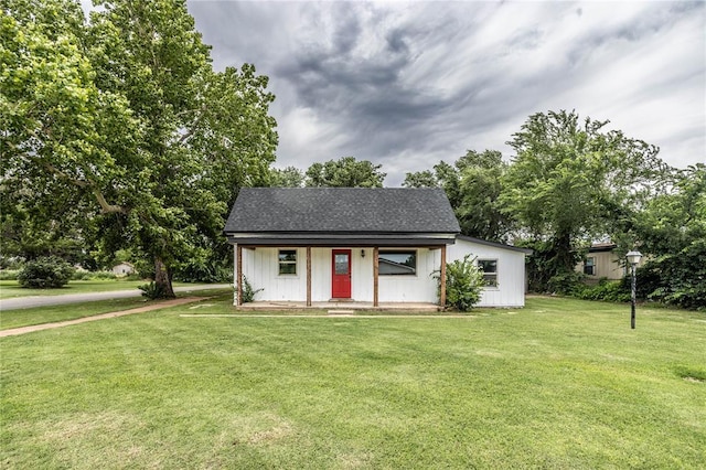 103 E Ash St, Carnegie, OK 73015 - view of outdoor structure featuring covered porch