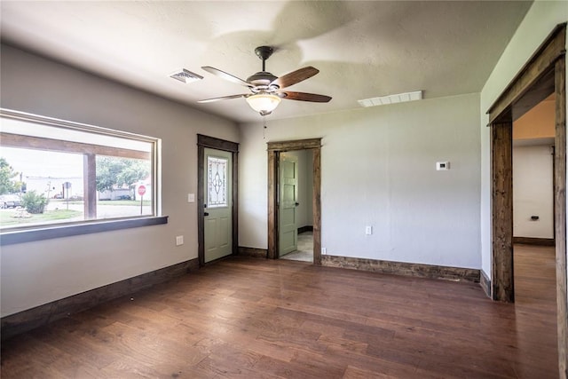 103 E Ash St, Carnegie, OK 73015 - spare room with ceiling fan and wood finished floors