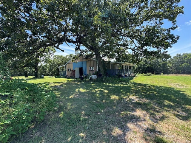 12237 N 359th Rd, Seminole, OK 74868 - view of grassy yard featuring an outbuilding
