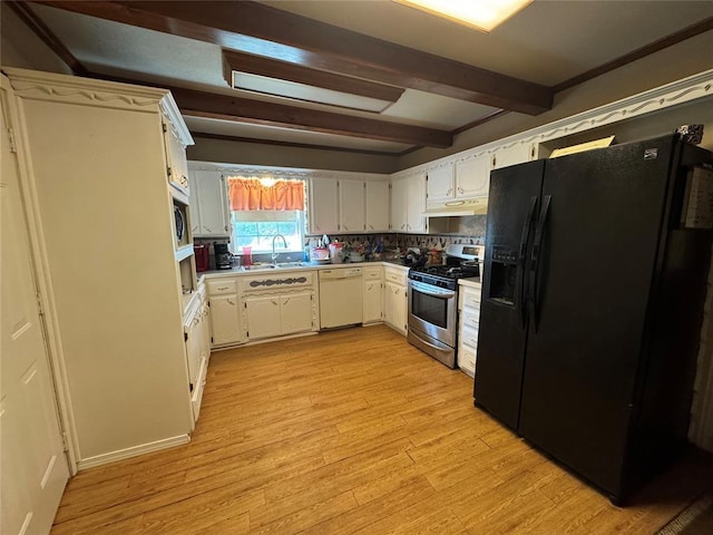 12237 N 359th Rd, Seminole, OK 74868 - kitchen featuring stainless steel appliances, under cabinet range hood, light wood finished floors, beam ceiling, and white cabinetry