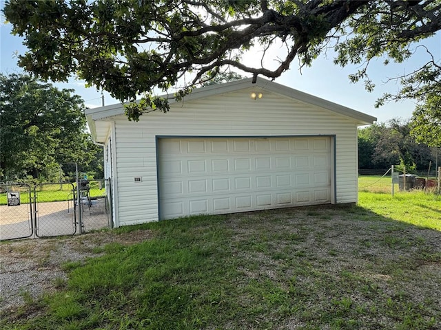 12237 N 359th Rd, Seminole, OK 74868 - detached garage featuring a gate