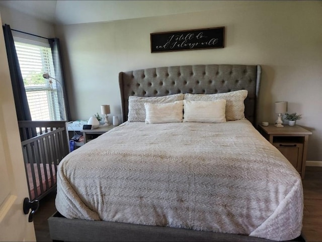 10812 NW 5th St, Yukon, OK 73099 - bedroom with wood finished floors and baseboards