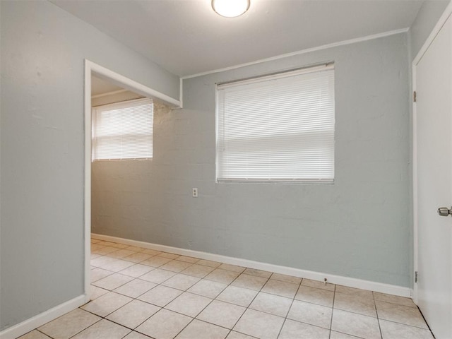 506 SW 24th St, Oklahoma City, OK 73109 - empty room with light tile patterned flooring and baseboards