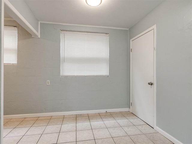506 SW 24th St, Oklahoma City, OK 73109 - spare room featuring baseboards and light tile patterned flooring