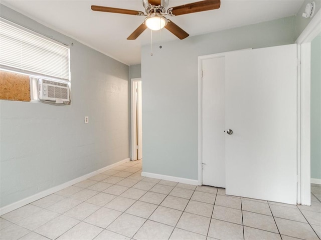 506 SW 24th St, Oklahoma City, OK 73109 - unfurnished bedroom with light tile patterned floors and ceiling fan