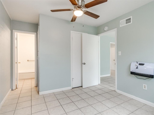 506 SW 24th St, Oklahoma City, OK 73109 - unfurnished bedroom featuring light tile patterned floors and a ceiling fan