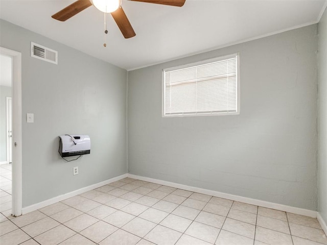 506 SW 24th St, Oklahoma City, OK 73109 - empty room featuring ceiling fan and light tile patterned flooring