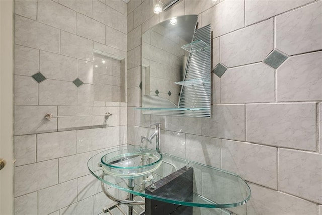 2527 NW 62nd St Unit 214, Oklahoma City, OK 73112 - bathroom featuring a sink and radiator heating unit