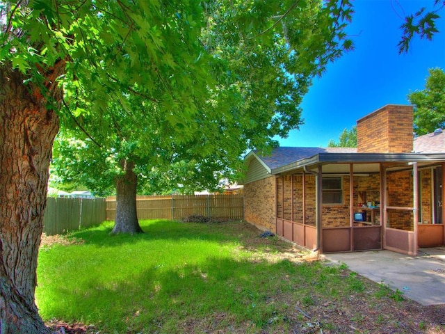 804 Royal Ln, Yukon, OK 73099 - fenced backyard featuring a patio