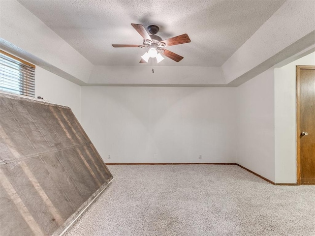 804 Royal Ln, Yukon, OK 73099 - unfurnished bedroom featuring carpet flooring, a textured ceiling, and a ceiling fan