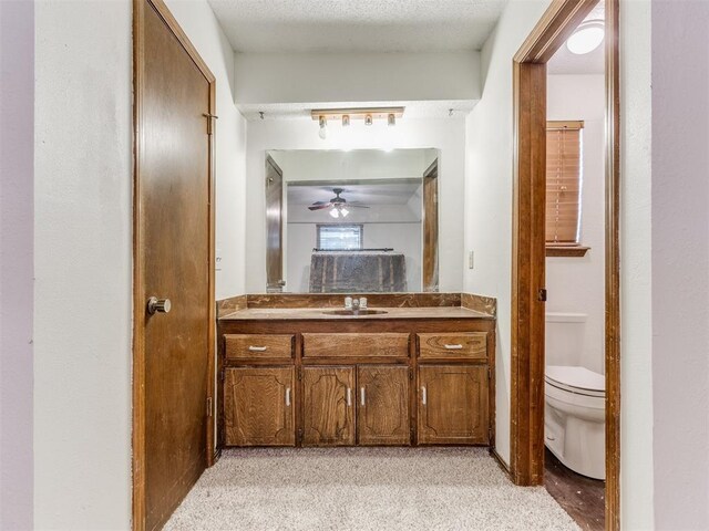 804 Royal Ln, Yukon, OK 73099 - bathroom featuring vanity and ceiling fan