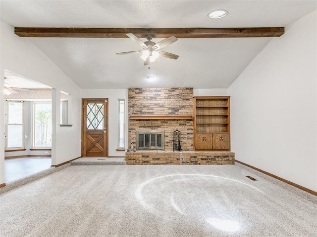 804 Royal Ln, Yukon, OK 73099 - unfurnished living room featuring ceiling fan, carpet flooring, and a fireplace