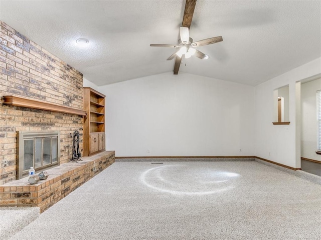 804 Royal Ln, Yukon, OK 73099 - unfurnished living room featuring a textured ceiling, a ceiling fan, a fireplace, and carpet flooring