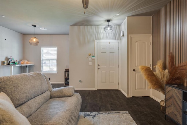1010 SW 91st St, Oklahoma City, OK 73139 - living area featuring baseboards and dark wood-style flooring