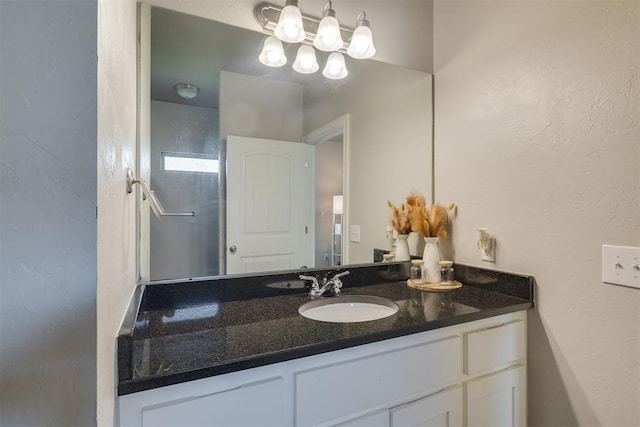 1010 SW 91st St, Oklahoma City, OK 73139 - bathroom featuring vanity and a textured wall