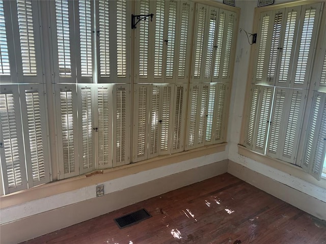 detailed view of wood finished floors and baseboards