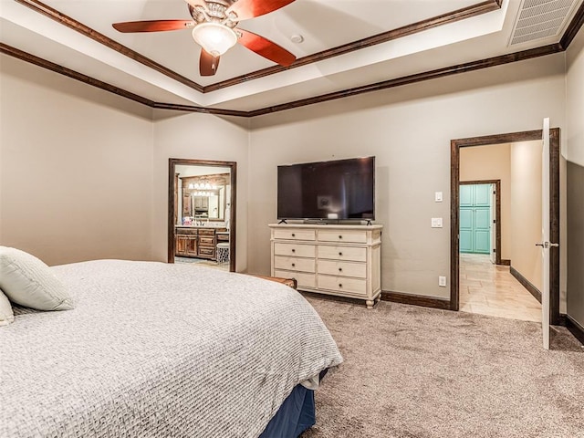 4311 Moorgate Dr, Norman, OK 73072 - carpeted bedroom with crown molding, a tray ceiling, and a ceiling fan