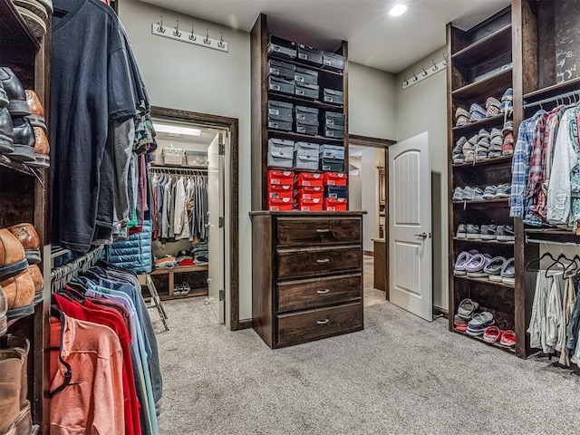 4311 Moorgate Dr, Norman, OK 73072 - walk in closet with carpet flooring