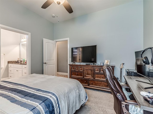 4311 Moorgate Dr, Norman, OK 73072 - carpeted bedroom with ensuite bathroom and ceiling fan