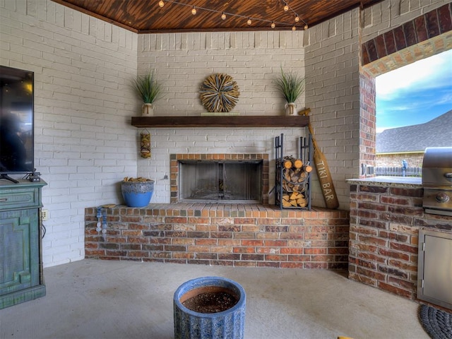 4311 Moorgate Dr, Norman, OK 73072 - view of patio featuring a brick fireplace and area for grilling