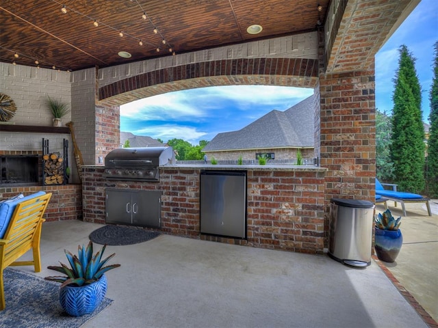 4311 Moorgate Dr, Norman, OK 73072 - view of patio / terrace with an outdoor kitchen