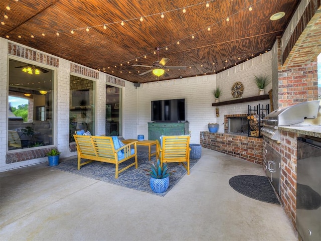 4311 Moorgate Dr, Norman, OK 73072 - view of patio featuring exterior kitchen, a ceiling fan, and an outdoor living space