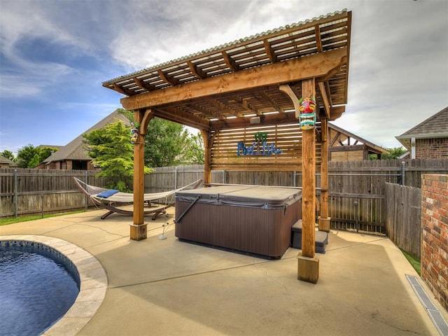 4311 Moorgate Dr, Norman, OK 73072 - fenced backyard with a hot tub, a patio, and a pergola