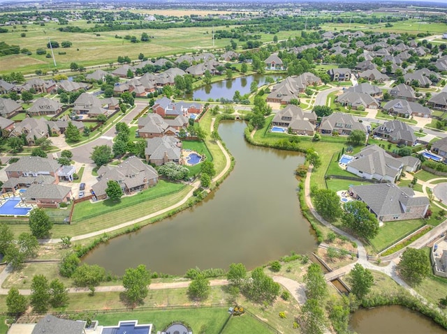 4311 Moorgate Dr, Norman, OK 73072 - aerial view of property's location with a large body of water and nearby suburban area