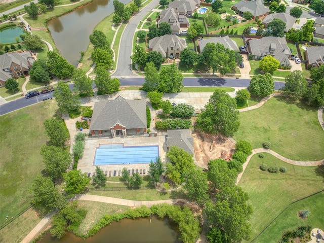 4311 Moorgate Dr, Norman, OK 73072 - aerial view of property and surrounding area with a large body of water and nearby suburban area