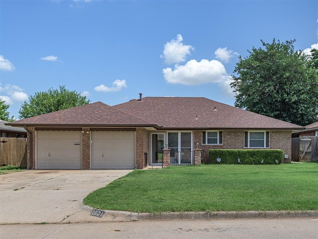 2821 SW 86th St, Oklahoma City, OK 73159 - single story home with a garage, brick siding, driveway, and a shingled roof