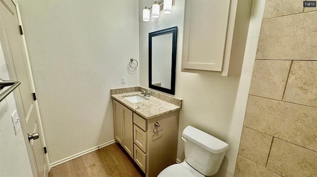 1614 SW C Ave, Lawton, OK 73501 - bathroom with vanity and wood finished floors