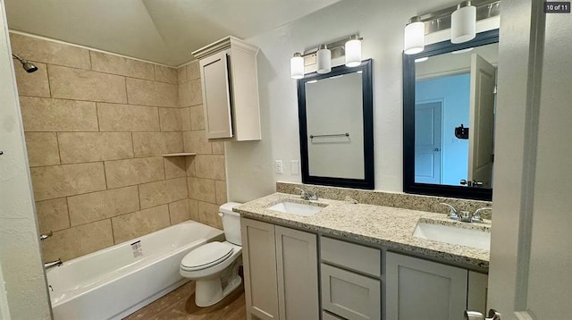 1614 SW C Ave, Lawton, OK 73501 - full bathroom with double vanity and washtub / shower combination