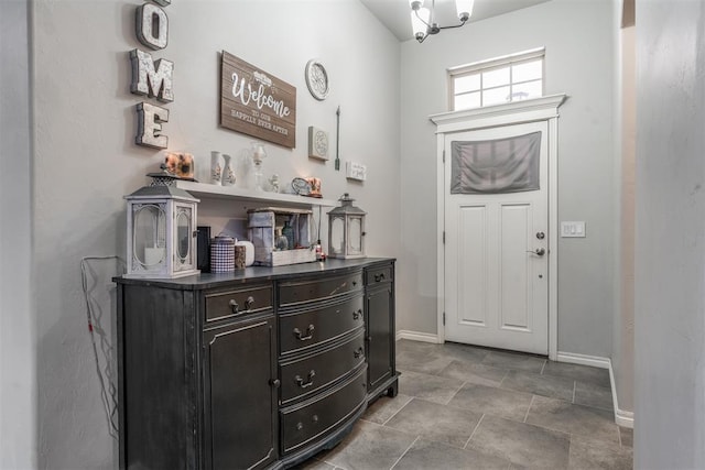 3309 Austrian Pine Ln, Yukon, OK 73099 - entrance foyer with baseboards and stone finish flooring