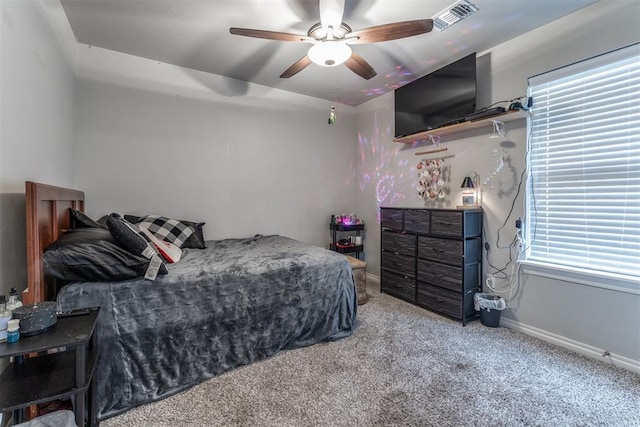3309 Austrian Pine Ln, Yukon, OK 73099 - carpeted bedroom featuring baseboards and a ceiling fan