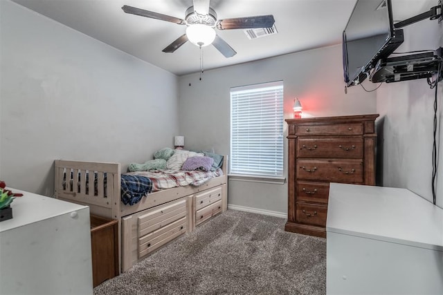 3309 Austrian Pine Ln, Yukon, OK 73099 - carpeted bedroom with baseboards and ceiling fan