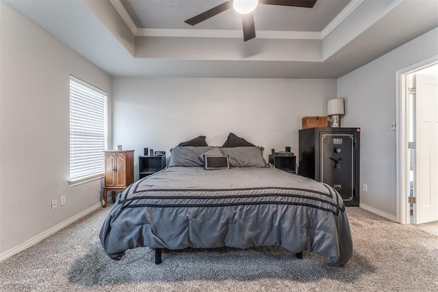 3309 Austrian Pine Ln, Yukon, OK 73099 - bedroom with crown molding, light colored carpet, a raised ceiling, and a ceiling fan