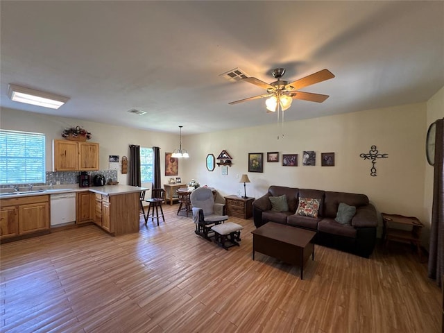 35352 Ew 1260th Rd, Seminole, OK 74868 - living area featuring light wood finished floors and a ceiling fan
