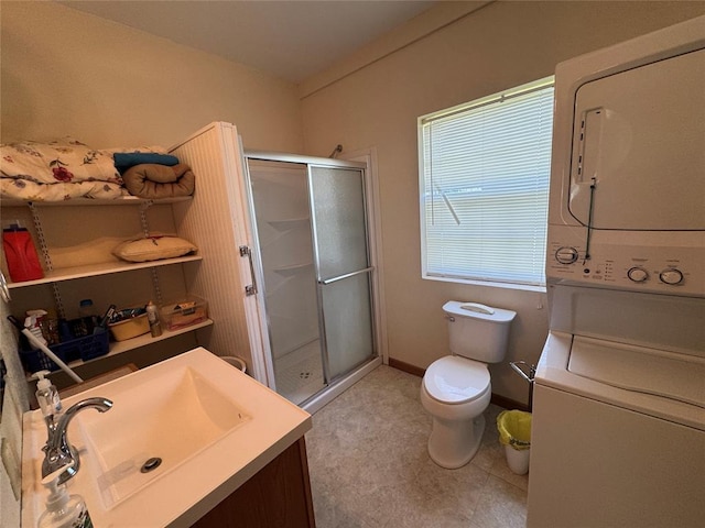 35352 Ew 1260th Rd, Seminole, OK 74868 - full bathroom featuring stacked washer / dryer, a stall shower, and vanity