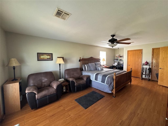 35352 Ew 1260th Rd, Seminole, OK 74868 - bedroom featuring light wood finished floors and ceiling fan