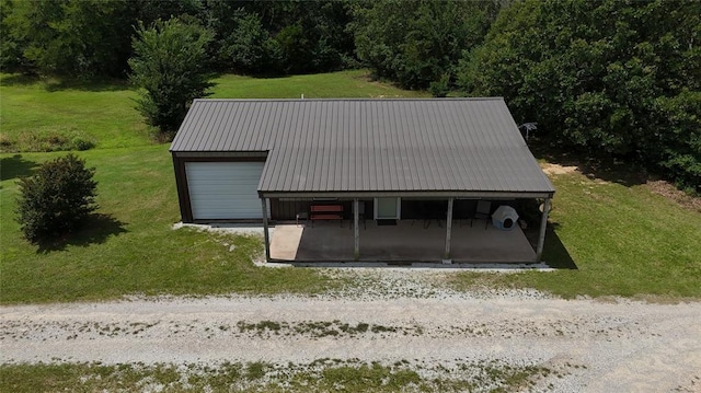 35352 Ew 1260th Rd, Seminole, OK 74868 - detached garage featuring a view of trees