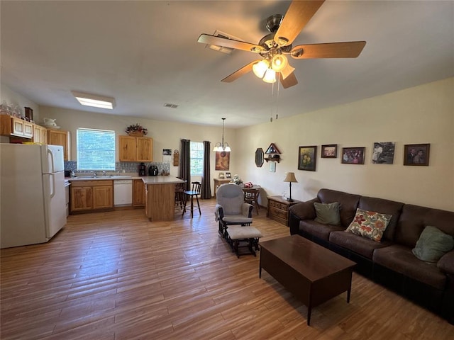 35352 Ew 1260th Rd, Seminole, OK 74868 - living room featuring light wood-style flooring and a ceiling fan