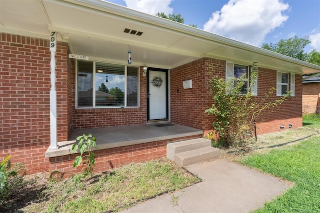 709 W Hughbert St, Norman, OK 73069 - entrance to property with brick siding and a porch